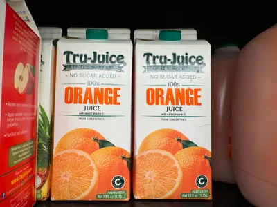Boxed, refrigerated orange juice with no sugar added.