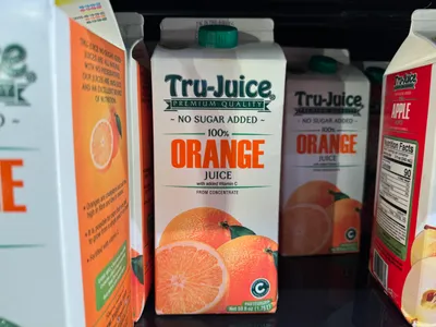 Box of orange juice with added vitamin C.