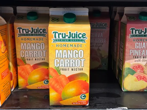 Mango carrot fruit nectar in a carton.