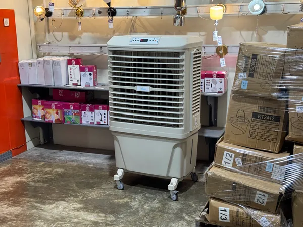 Single stage evaporative cooler two water inlets plus a hose connector.