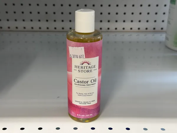 Ricinus communis castor seed oil for the treatment of body, hair and brows.